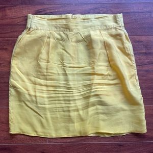 Vibrant yellow silk mini skirt